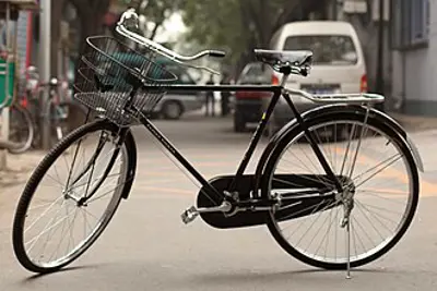 1817 the earliest form of bicycle the dandy horse is driven by 06 12