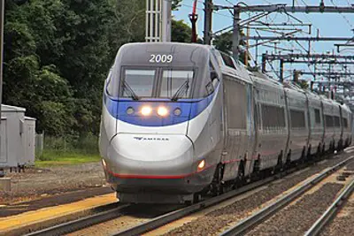 An express train called the Transcontinental Express arrives in San Francisco via the first transcontinental railroad, 8