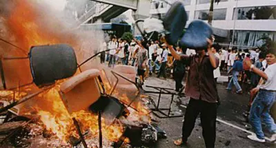 1998 race riots break out in jakarta indonesia where shops owne 05 13